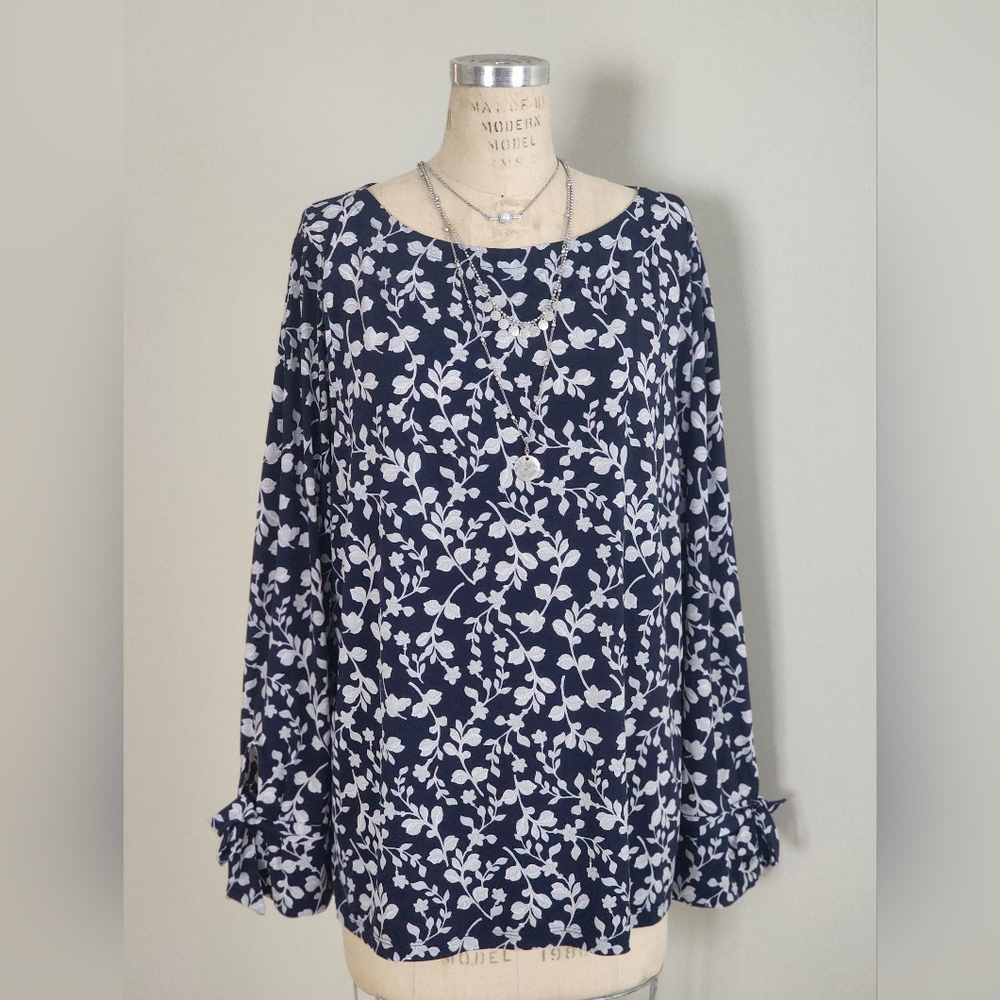 Floral top with tie knots on sleeves